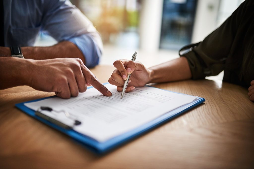 Lawyer, broker or HR manager signing a contract agreement with client or employee. Financial advisor asking for womans signature for insurance, legal paperwork or claim document. SSUCv3H4sIAAAAAAAAA21Sy27jMAz8F51zsOMk2+ZXiqKgJSYmKomGRKf1Fvn3pSQD29dthiDnIfvDjJDJmvOHIe+XLAmEOJpztzMJo8NU4S0Np64idCScCHxlI4idIgQ0Z5MnZnl56Ifh0Jv7zmQBWTJm1VZmQfCqh5X/N9WxnhrdXsYCdLP7dX4veTxCFXwy4PrTaY+2B905DN2xOxwvj3/M8868vgmmsNnC4ogbnBNZitdGWKZSrSbT1hyKaZ4W0Vul9rXw1jWyoKyzVuw1zsVqhLiEsZybfr9/6LvjoeYri7mldtp2y19fYSIVTWszrPrktoTL7BmclJDaikfc7IvZlzw6cAkhZKHQwoCHsFaEK2KoKHCWeWLhXOkKayCbuJKZoztWZNnzkkZ+b3OI5TmC9oXmgzNn+qwz0rXGqKMm4Wl2CL68Q9Ggd4EtQfmD9FsFjNKuLcRv1/nn6C9zhCbmKGf2t9ay3w/pouh+/weipCXWrQIAAA==